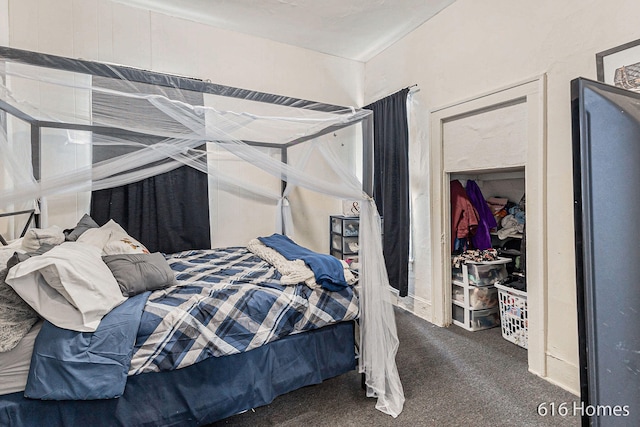 carpeted bedroom featuring a closet