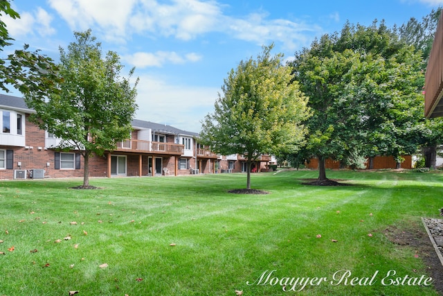 view of yard featuring central AC