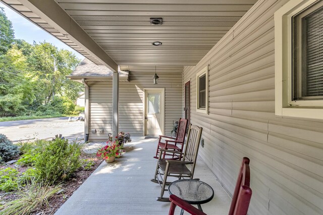 view of patio featuring a porch