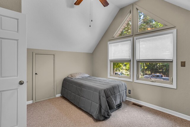 bedroom featuring light carpet, ceiling fan, and lofted ceiling