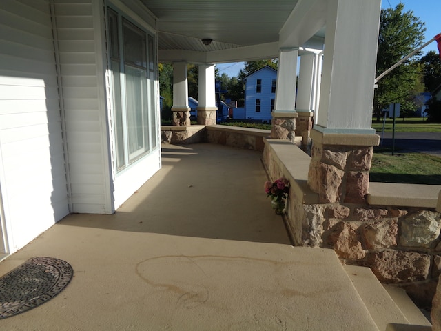 view of patio featuring a porch