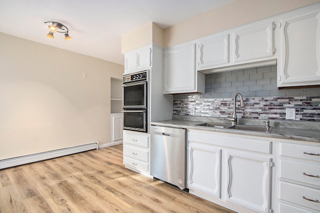 kitchen with dishwasher, light wood-type flooring, and white cabinets