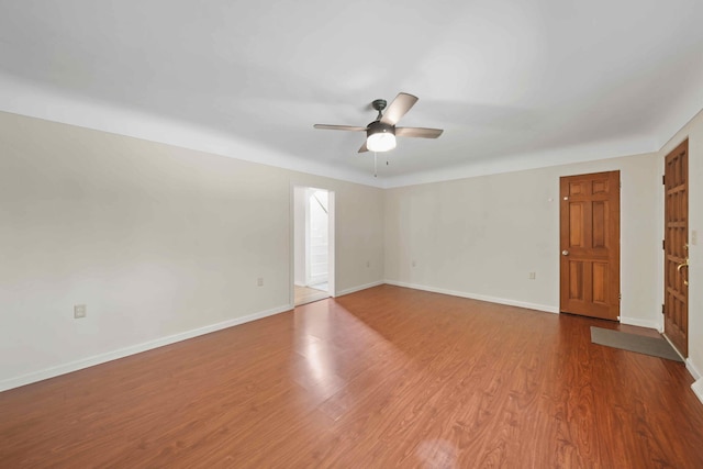 interior space featuring hardwood / wood-style floors and ceiling fan