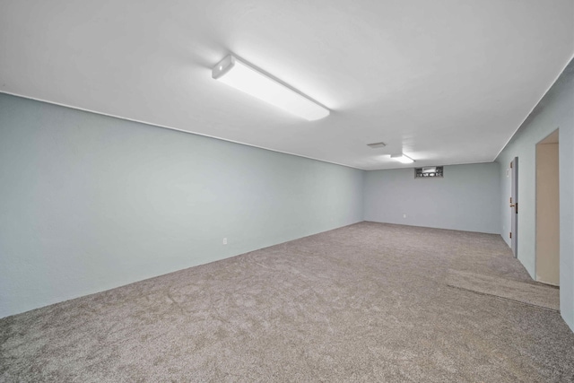 basement featuring carpet floors