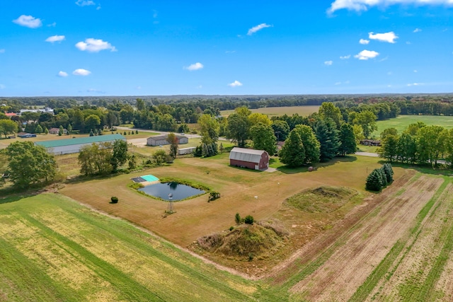 birds eye view of property featuring a rural view