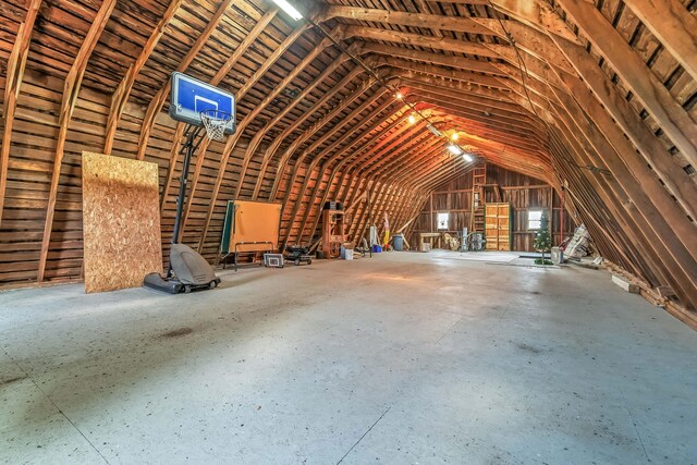 miscellaneous room featuring vaulted ceiling