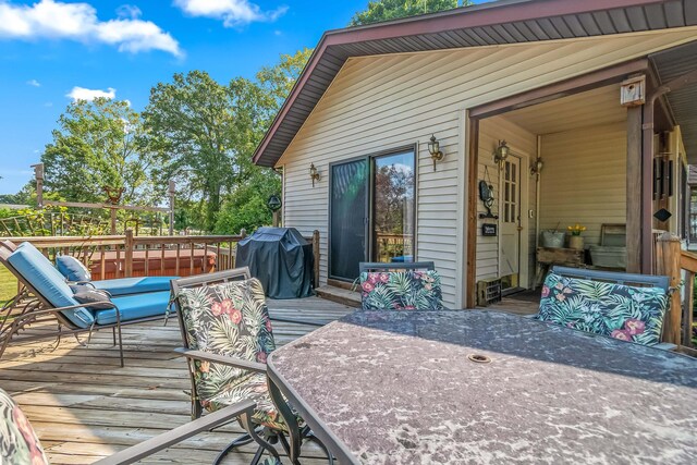 wooden terrace with grilling area