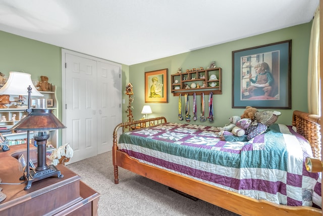 carpeted bedroom featuring a closet