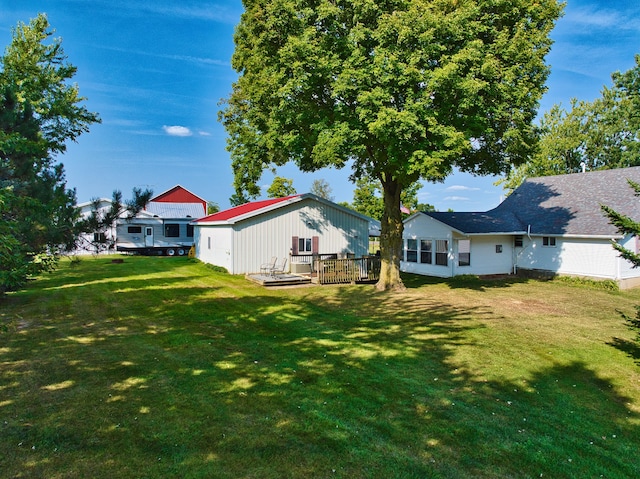 view of yard featuring a wooden deck