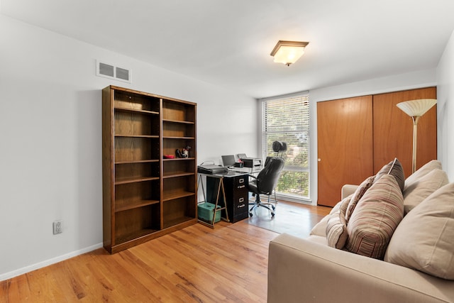 home office featuring light hardwood / wood-style floors