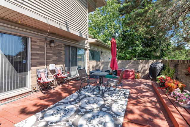 view of patio with a grill