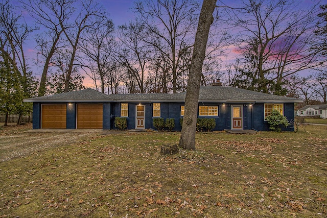 ranch-style house with a garage