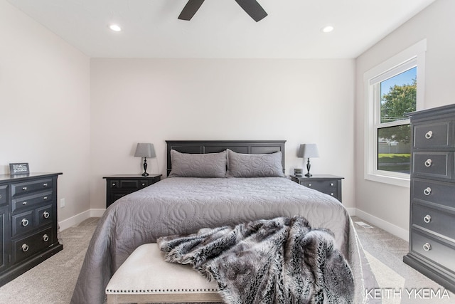 carpeted bedroom featuring ceiling fan