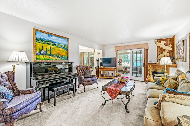 carpeted living room with a textured ceiling