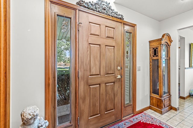 view of tiled foyer entrance