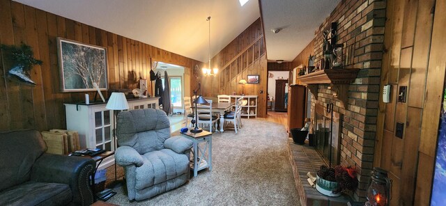 carpeted living room featuring lofted ceiling, a textured ceiling, a brick fireplace, and wooden walls