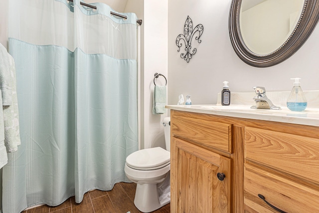 bathroom with vanity, toilet, hardwood / wood-style floors, and a shower with shower curtain