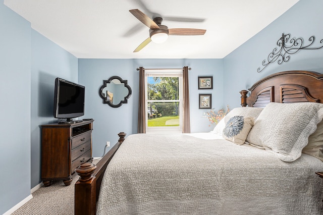 bedroom with ceiling fan and carpet flooring