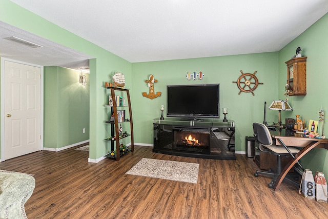 living room with dark wood-type flooring