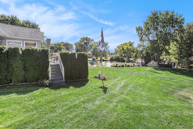 view of yard featuring a water view