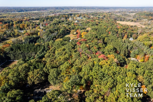 drone / aerial view with a forest view