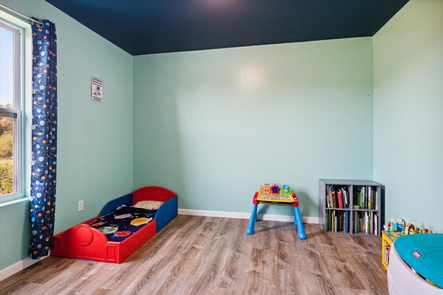 recreation room featuring light wood-type flooring