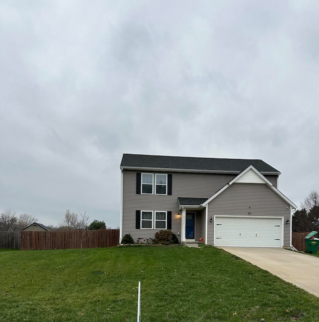 view of front property with a front lawn and a garage