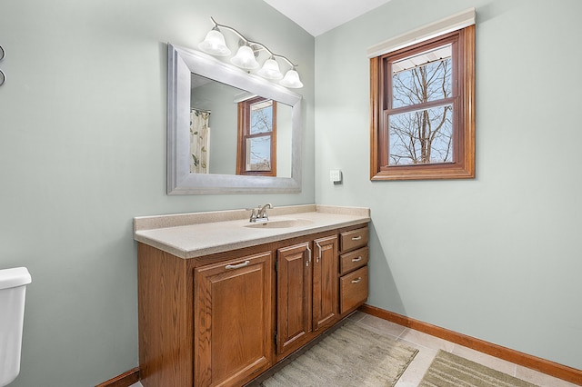 bathroom with vanity and tile patterned floors