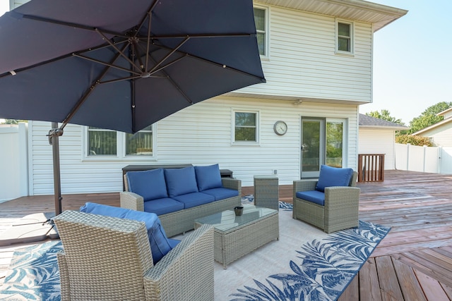 deck featuring outdoor lounge area