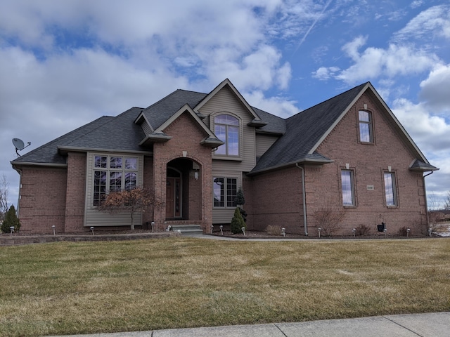 front of property featuring a front lawn