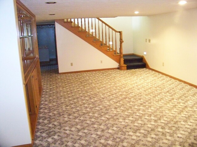 basement featuring carpet