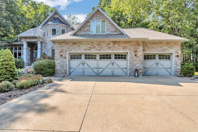 craftsman-style house featuring a garage