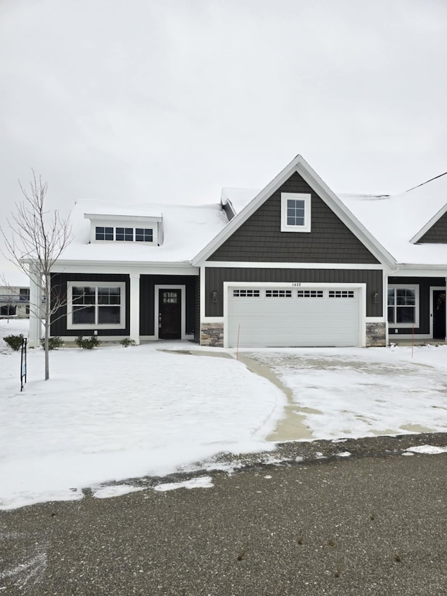 view of front of property featuring a garage