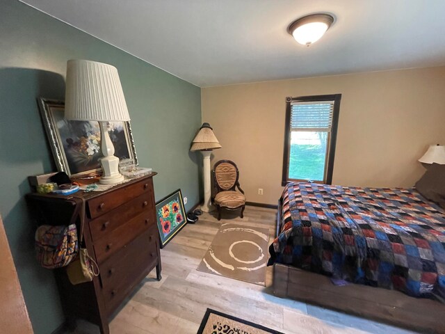 bedroom featuring light wood-type flooring