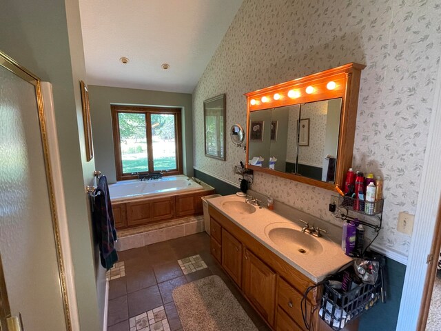 bathroom with vanity, plus walk in shower, tile patterned flooring, and vaulted ceiling