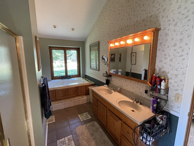 2622 S Sheridan Rd, Caro, MI 48723 - full bathroom with a sink, wallpapered walls, vaulted ceiling, and a bath