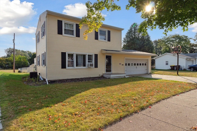 view of front of house with a garage, a front yard, central AC unit, and cooling unit