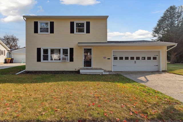 front facade featuring a front yard and a garage