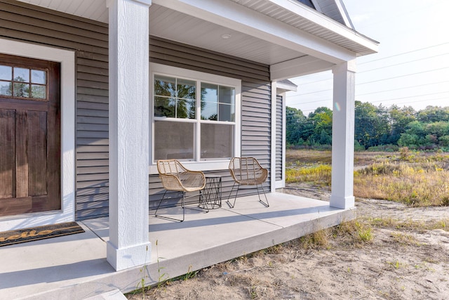 view of patio featuring a porch