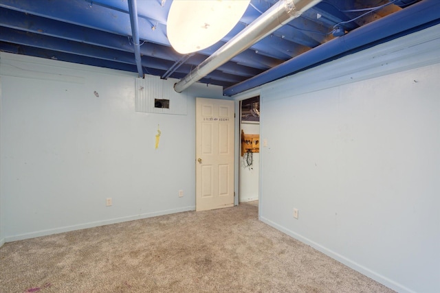 basement with carpet flooring