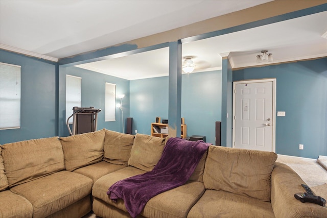 carpeted living room featuring ornamental molding