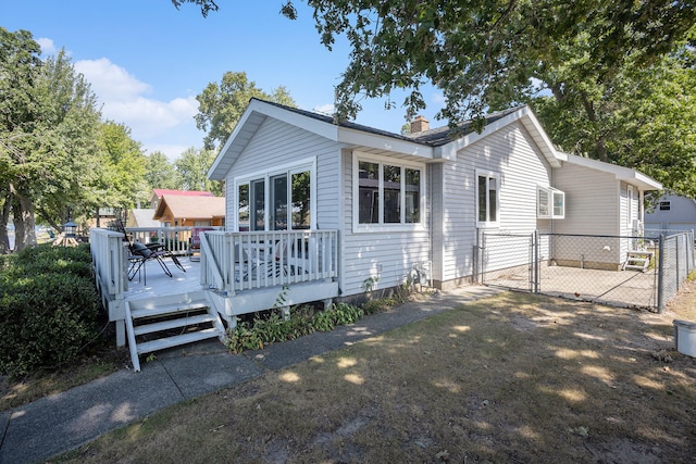 view of front of house with a deck