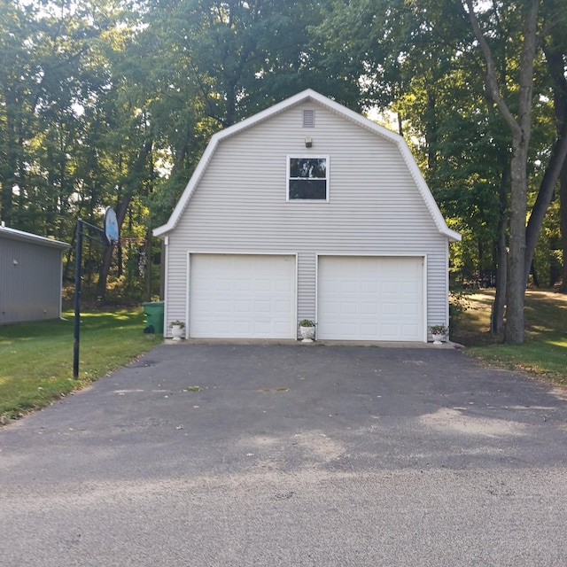 garage with a lawn