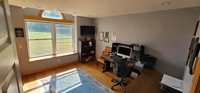 office area with wood-type flooring