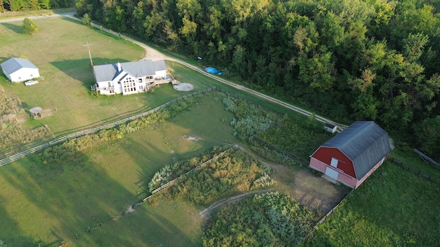 birds eye view of property featuring a rural view