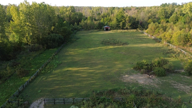 birds eye view of property featuring a rural view