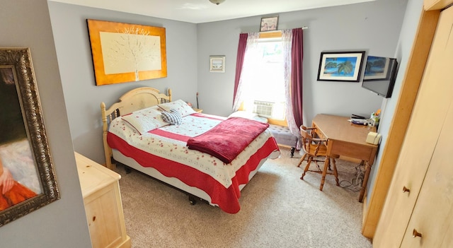 bedroom featuring light colored carpet