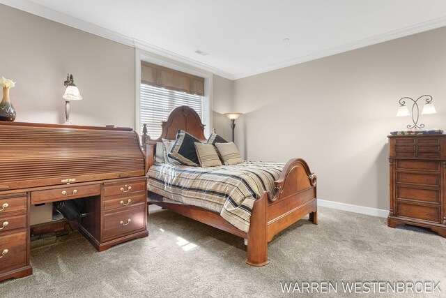 bedroom with carpet flooring and crown molding