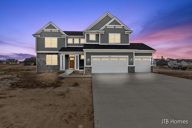 view of front of home with a garage