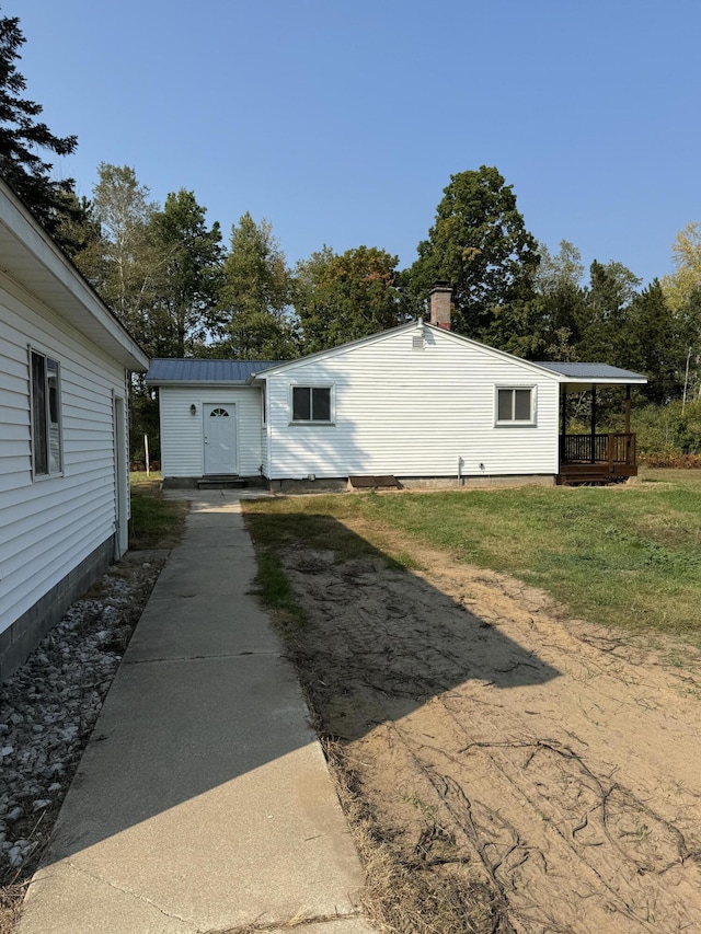 exterior space featuring a lawn